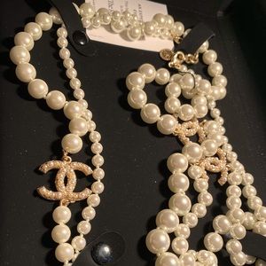 Authentic Chanel pearl necklace in original box and bag- great condition